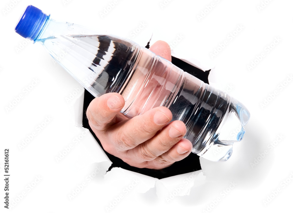 Man is holding bottle through a hole