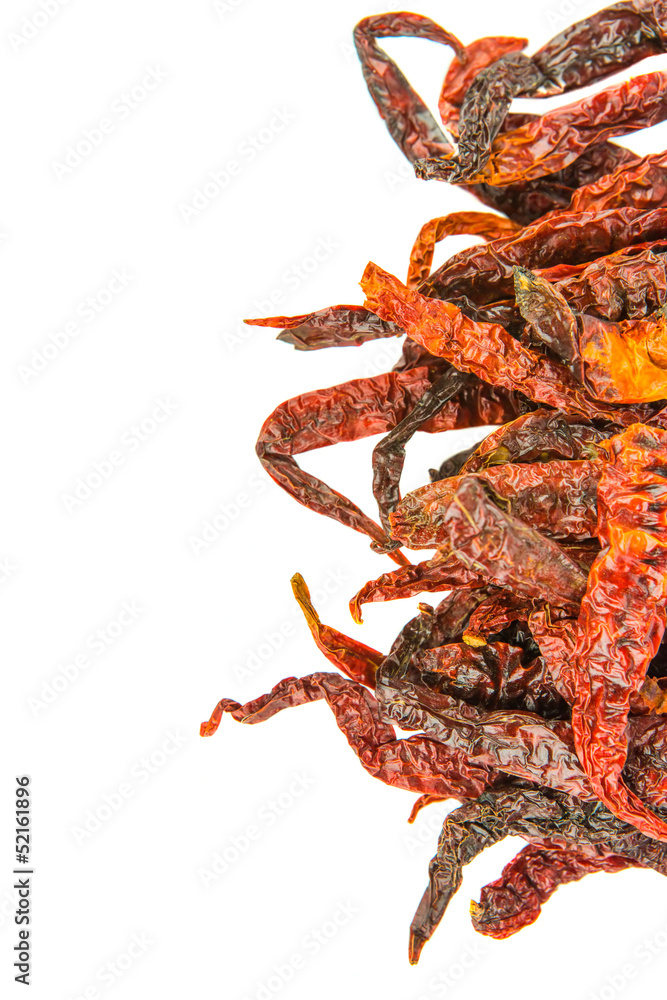 A group of dried chilly over white background