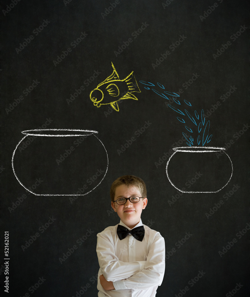 Thinking boy dressed as business man with chalk fish jump bowl