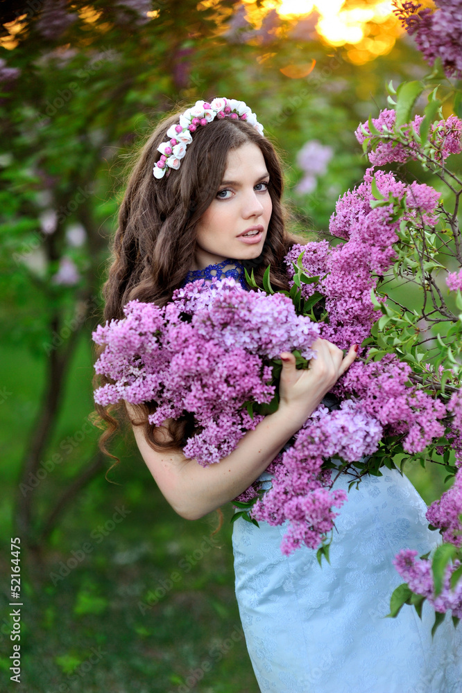beautiful girl with a flower lilac beautiful girl with a flower lilac
