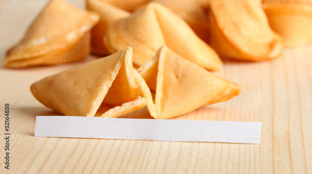 Fortune cookies on wooden table Fortune cookies on wooden table
