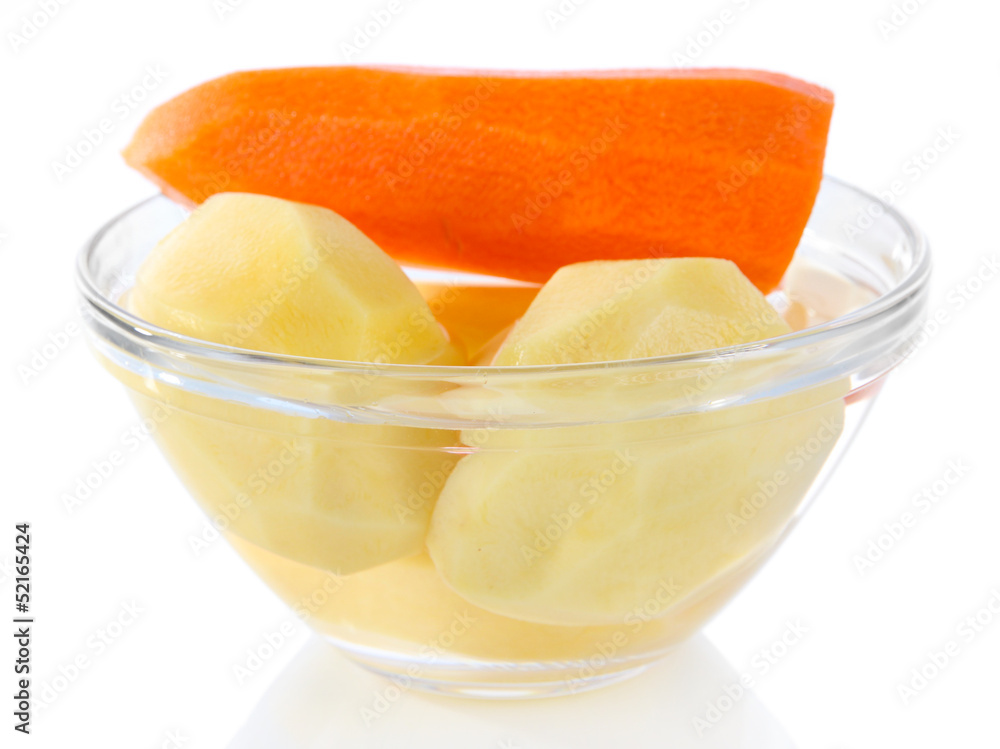Peeled vegetables in bowl isolated on white Peeled vegetables in bowl isolated on white