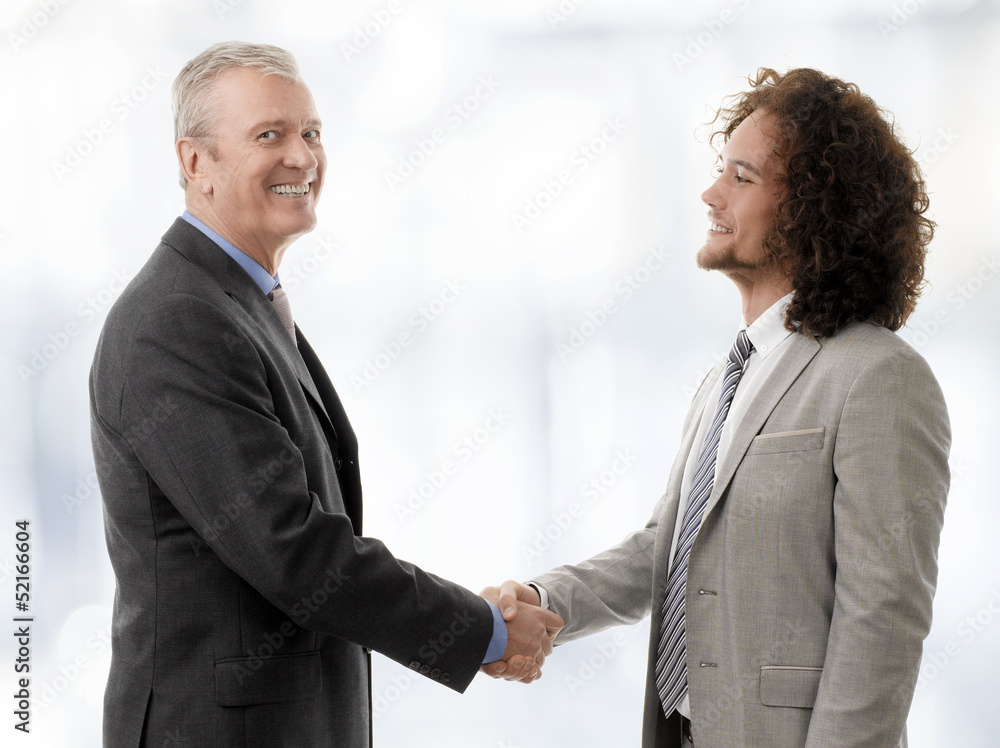 Two businessmen shaking hands Two businessmen shaking hands