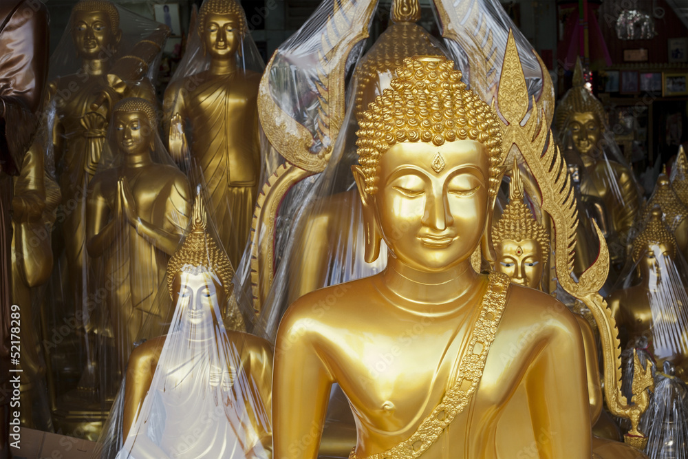Buddha statue for sale displayed outside shop in Bangkok