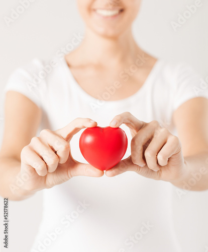 woman hands with heart