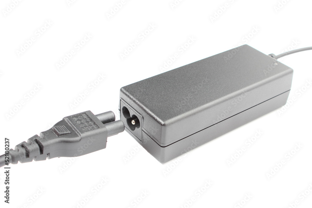 Computer charger for a laptop on white background Computer charger for a laptop on white background