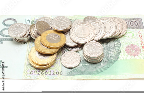Banknote and coins on white background