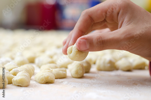 Hand preparing homemade italian gnocchi
