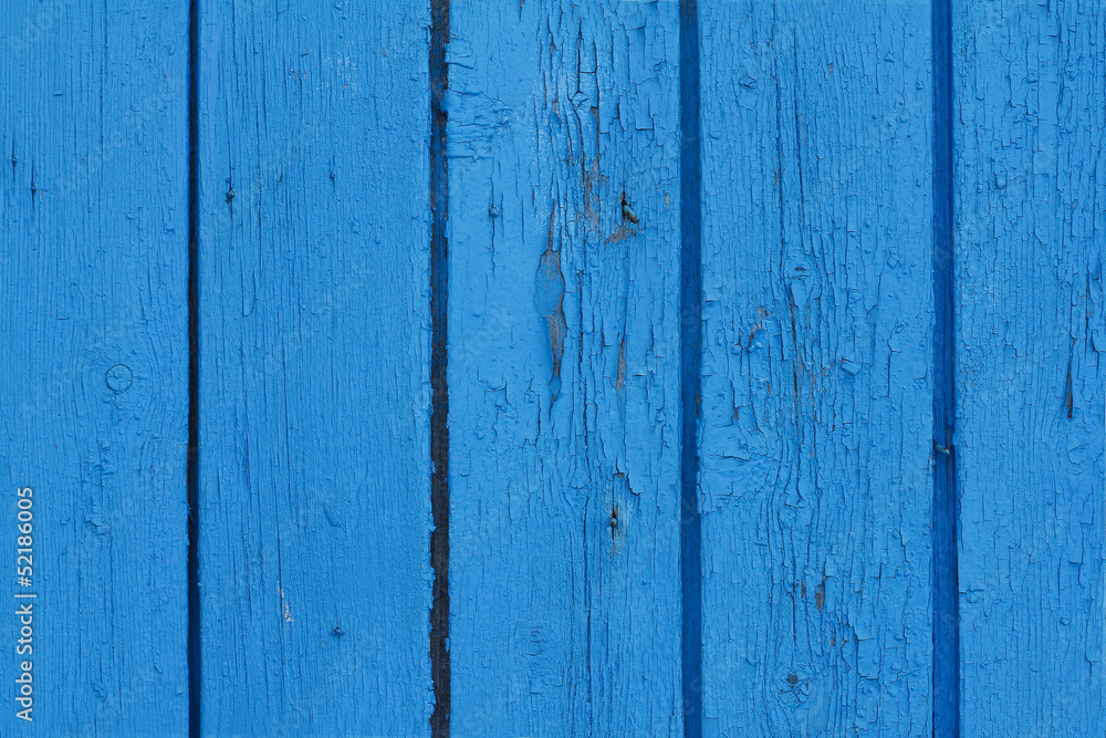 Old fence painted in blue colour - background Old fence painted in blue colour - background
