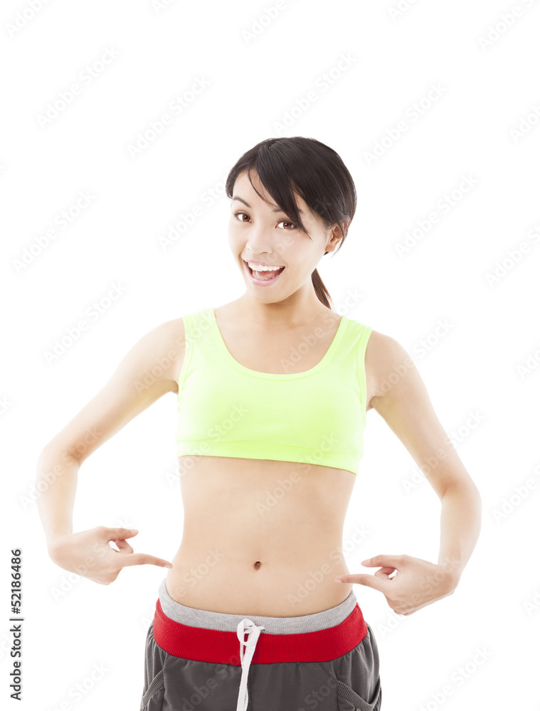 happy young woman doing exercise and point his waist happy young woman doing exercise and point his waist