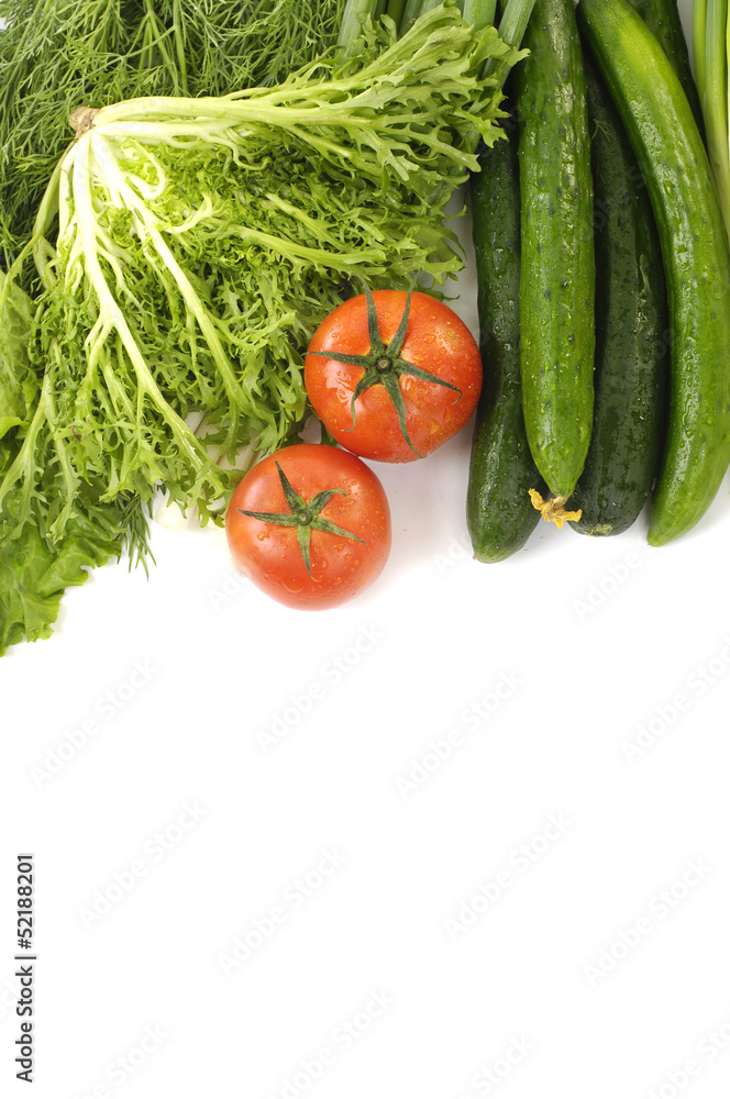 Healthy food. cucumbers and red tomato and green lettuce Healthy food. cucumbers and red tomato and green lettuce
