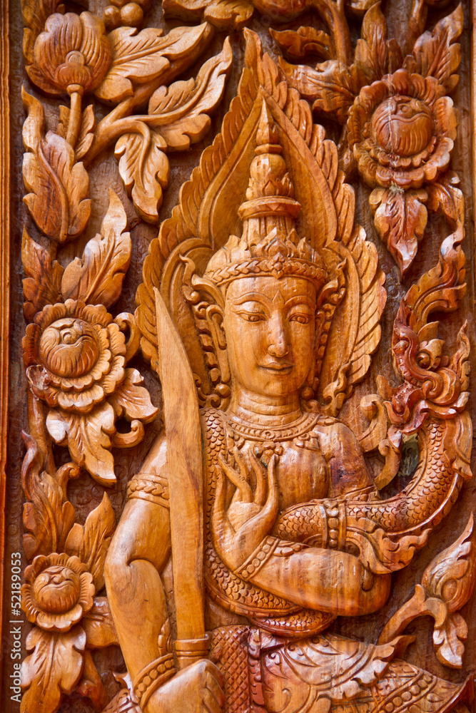Fototapeta premium Thai carving wood at window temple