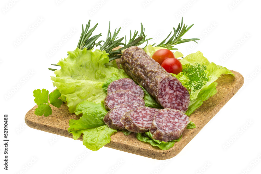 Salami with rosemary, salad and tomatoes Salami with rosemary, salad and tomatoes
