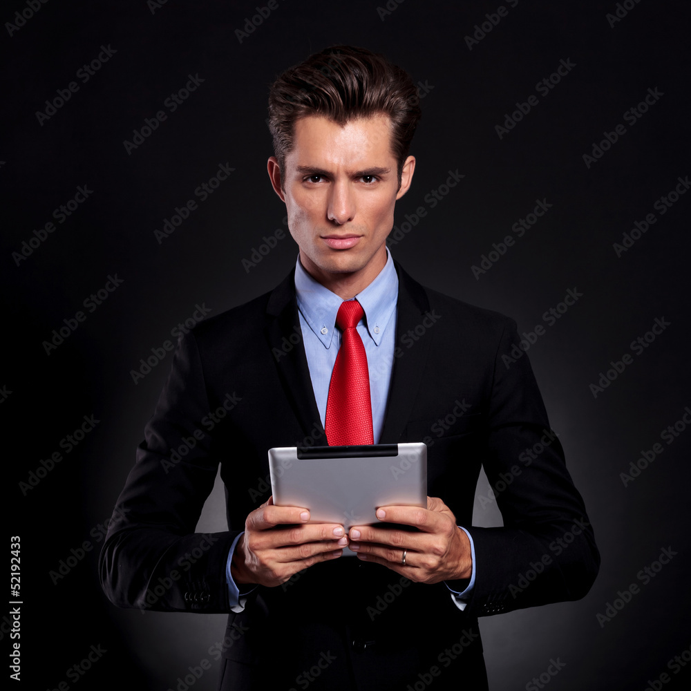 business man holds tablet business man holds tablet