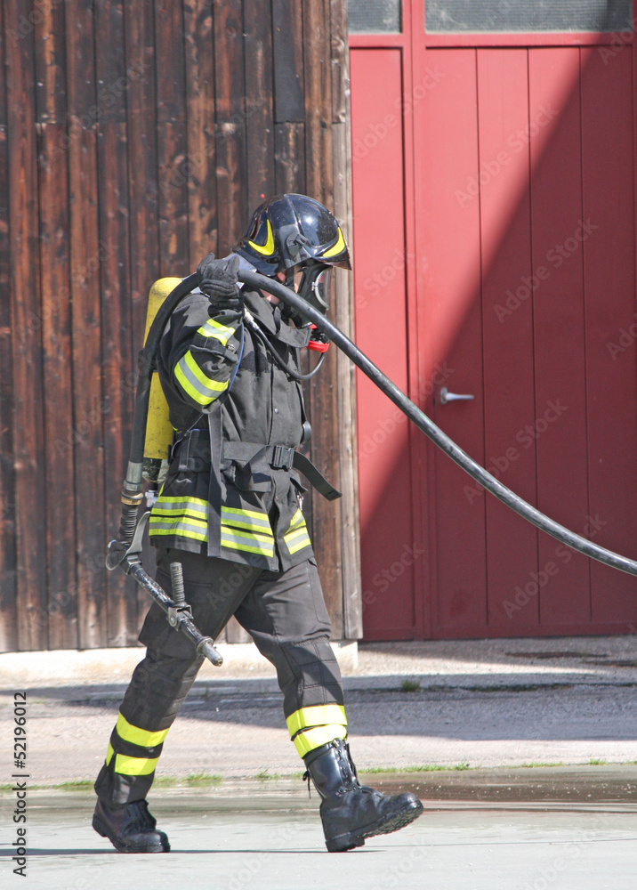 brave firefighters with oxygen tank fire during an exercise held brave firefighters with oxygen tank fire during an exercise held
