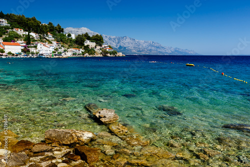 Fototapeta Naklejka Na Ścianę i Meble -  Beautiful Beach and Transparent Turquoise Adriatic Sea near Spli