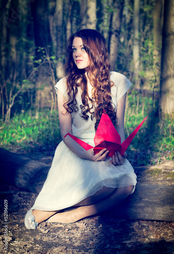 Girl with origami crane