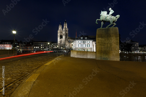 View on Grossmunster Church and Munsterbrucke Bridge in the Even