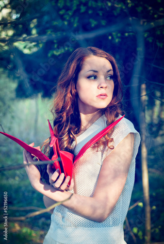 Girl with origami crane