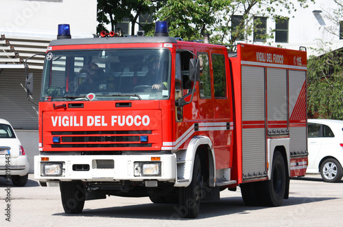fire truck arrives in speed to put out the fire in the city