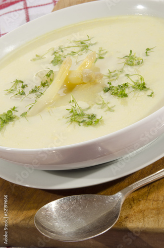 asparagus cream soup in a white bowl