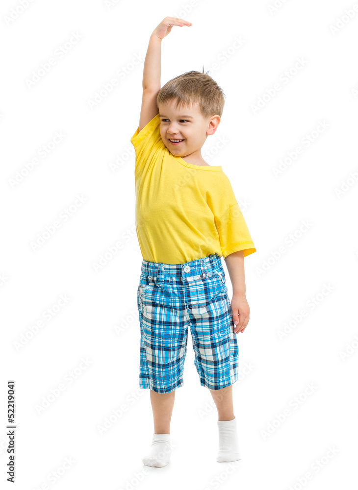 Kid demonstrating growing. Isolated on white studio shot. Kid demonstrating growing. Isolated on white studio shot.