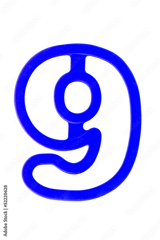 Plastic alphabet letter number 9 on white background with work p Plastic alphabet letter number 9 on white background with work p