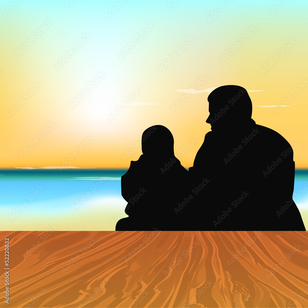 Silhouette of a Father with his child sitting in evening backgr