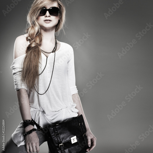 Wallpaper Mural beautiful girl is in fashion style on  grey  background Torontodigital.ca