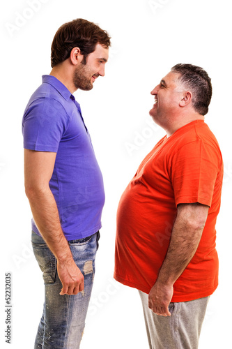Two happy men standing face to face