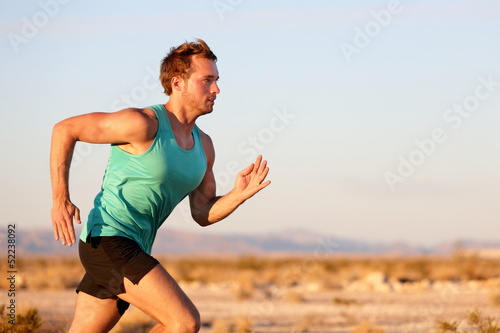 Running man sprinting cross country trail run
