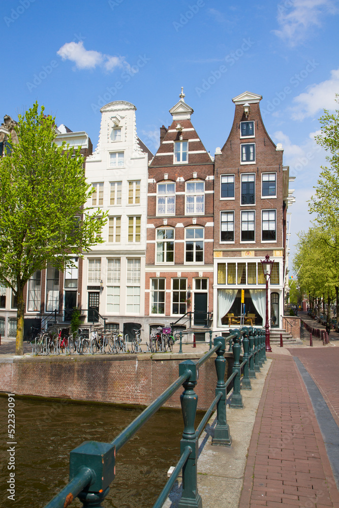 Fototapeta premium bridge to old houses, Amsterdam