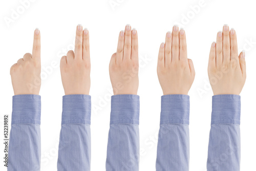 Fotografija Woman's hand counts from one to five.