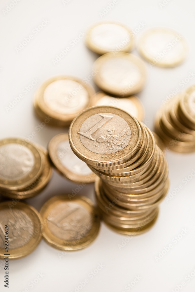 Currency - Pile of used one euro coins Currency - Pile of used one euro coins