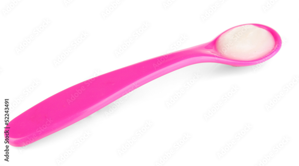 Pink spoon for baby food isolated on white Pink spoon for baby food isolated on white