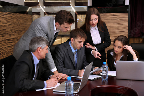Business people working in ...