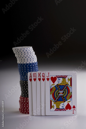 Poker hand with chips. photo