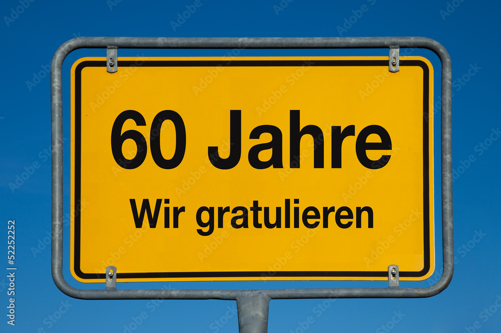 Ortsschild mit blauem Himmel 60 JAHRE WIR GRATULIEREN Ortsschild mit blauem Himmel 60 JAHRE WIR GRATULIEREN