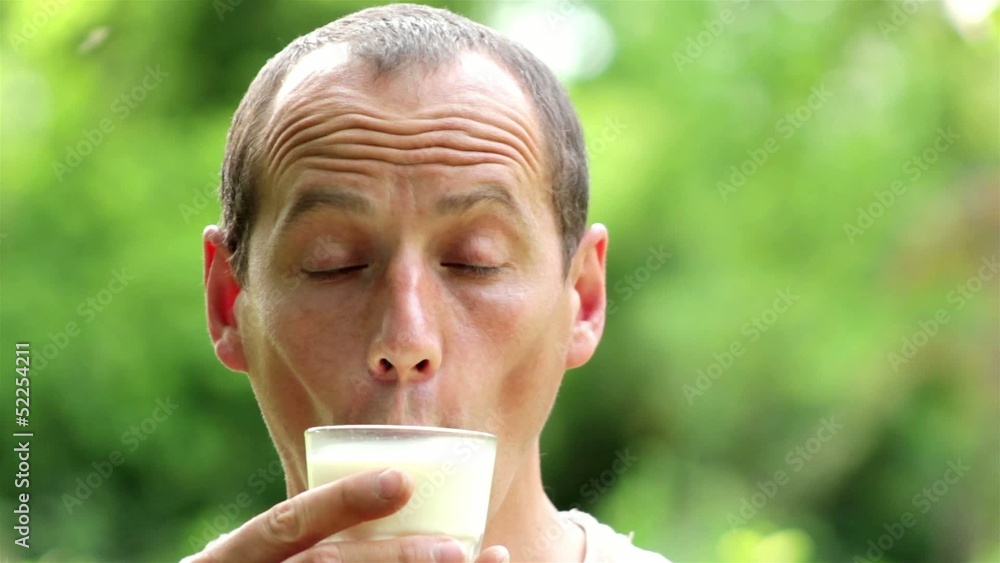 portrait of a man drinking milk portrait of a man drinking milk