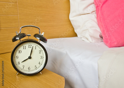 alarm-clock in morning bedroom