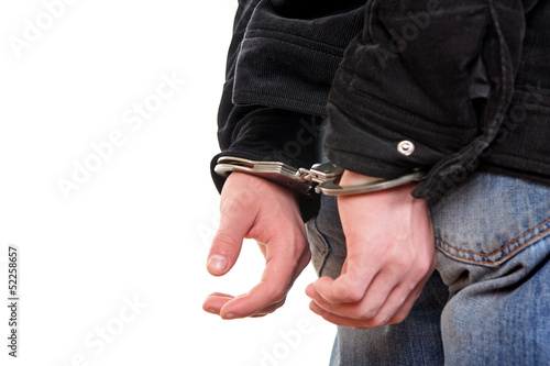 Handcuffs on Hands closeup