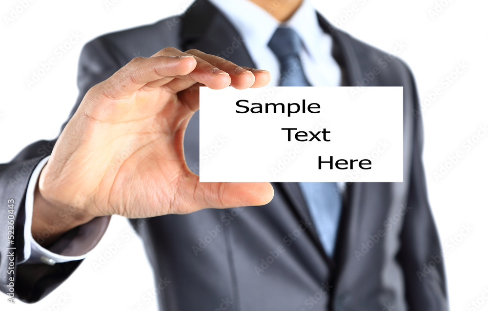 Business man handing a blank business card Business man handing a blank business card
