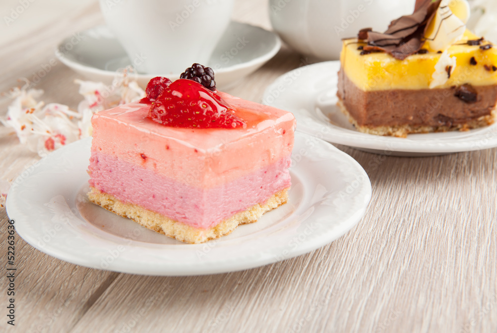 Cream pastries with chocolate and strawberries Cream pastries with chocolate and strawberries