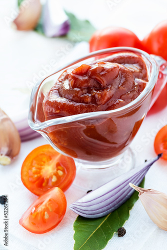 Traditional homemade tomato sauce with ingredients