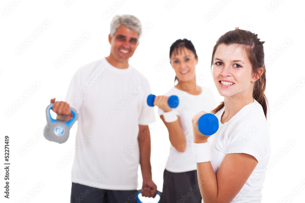 young girl exercising in front of her parents young girl exercising in front of her parents