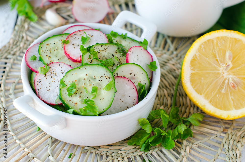 Salad from fresh cucumbers , radish Salad from fresh cucumbers , radish