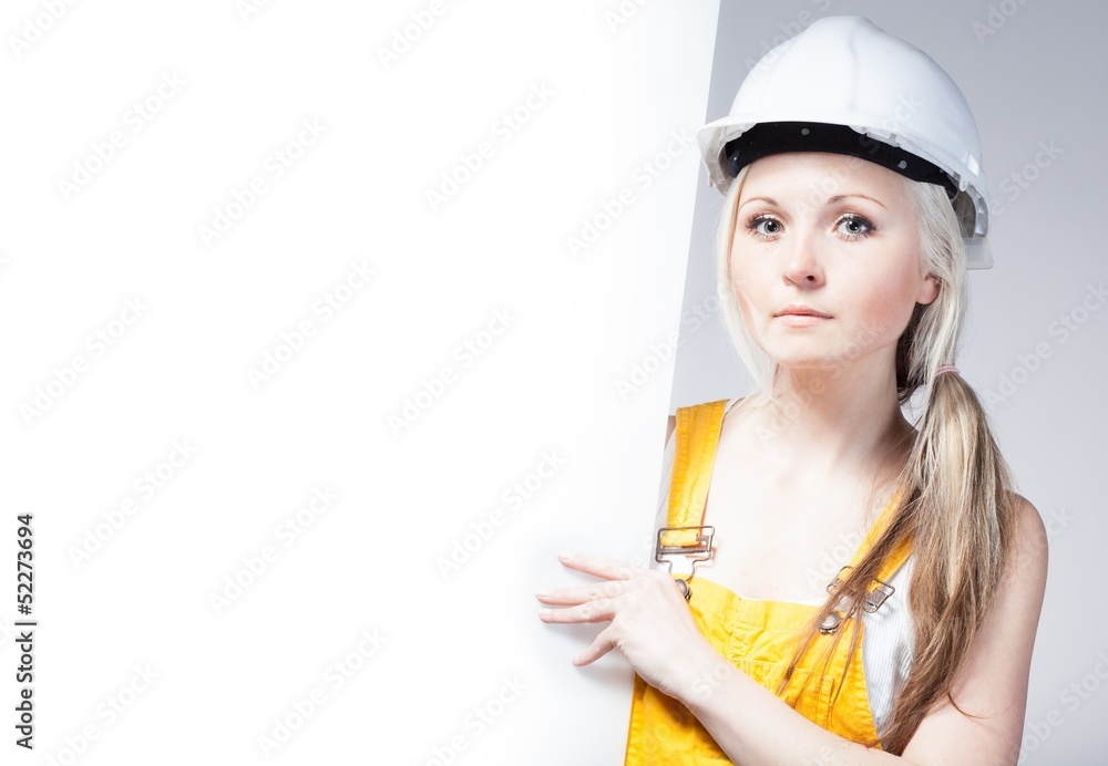 Young builder woman construction worker, empty frame Young builder woman construction worker, empty frame
