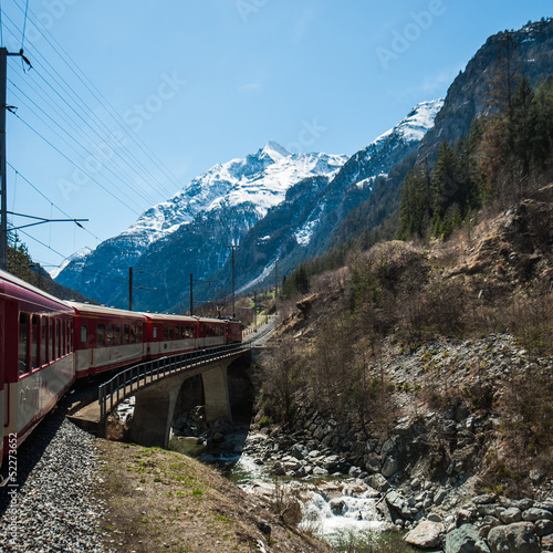 Red Train view with Snow Mountain Heading to Zermatt, Switzerla