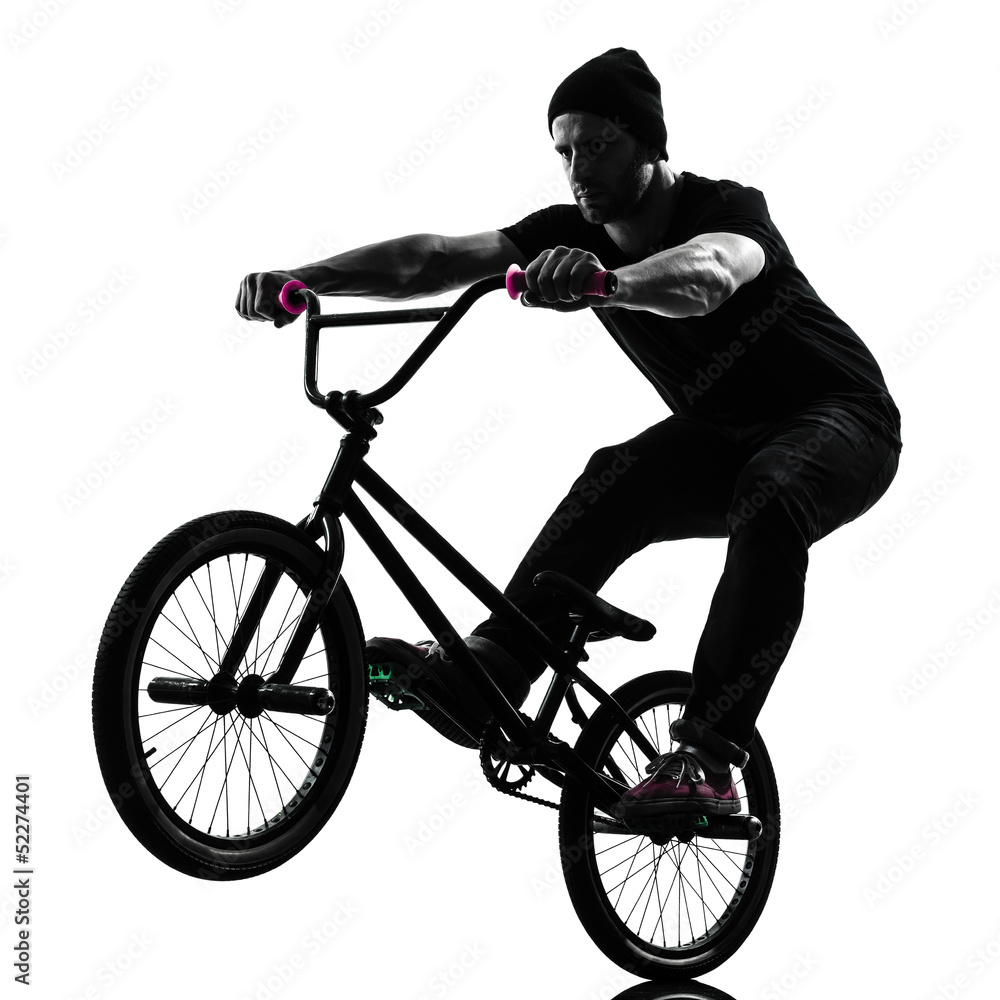 Obraz premium man bmx acrobatic figure silhouette