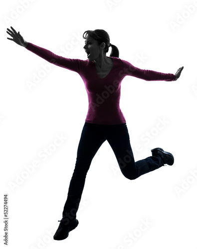 woman happy running jumping silhouette © snaptitude